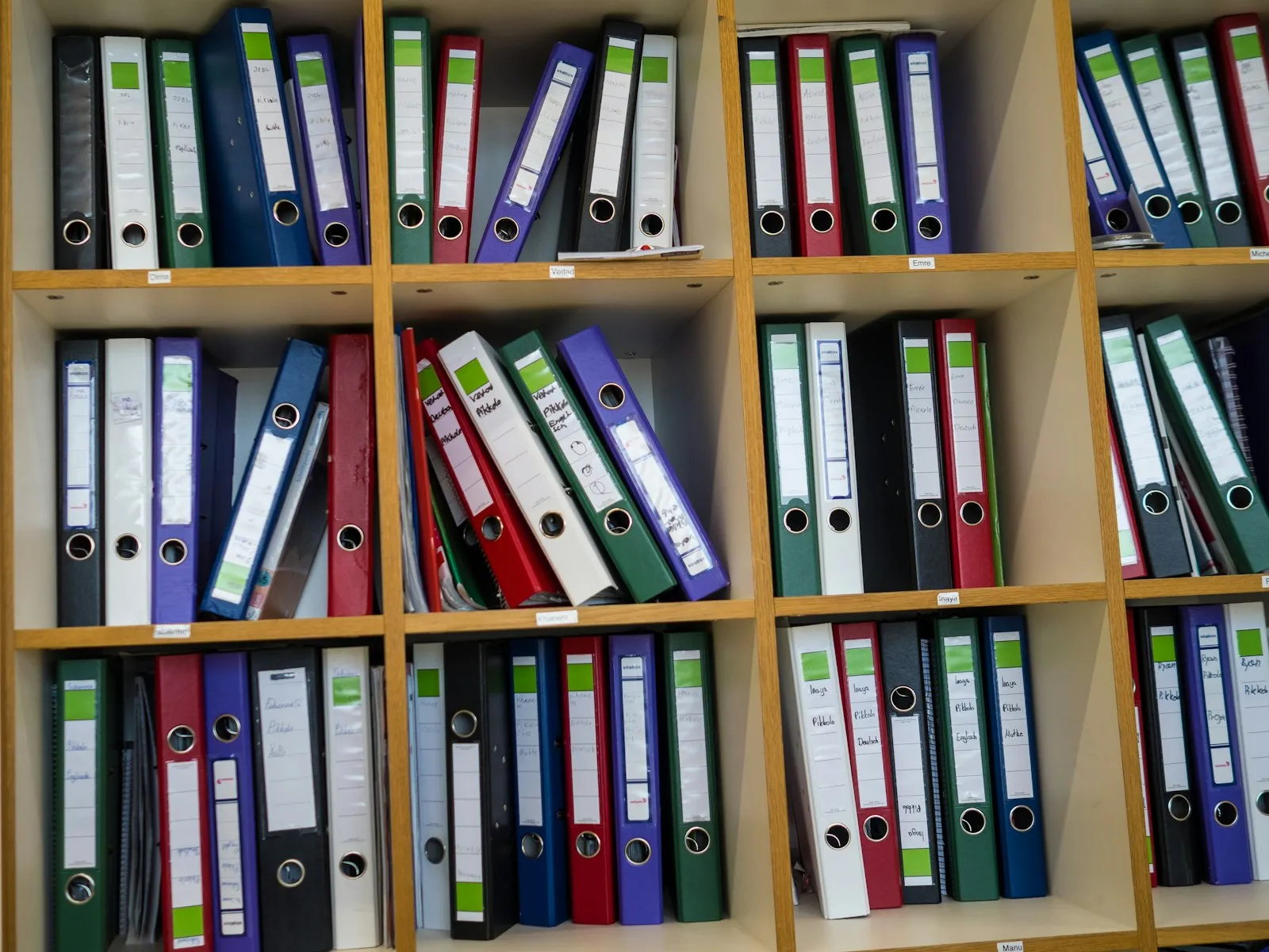 Shelves of town records and binders in the town office archive