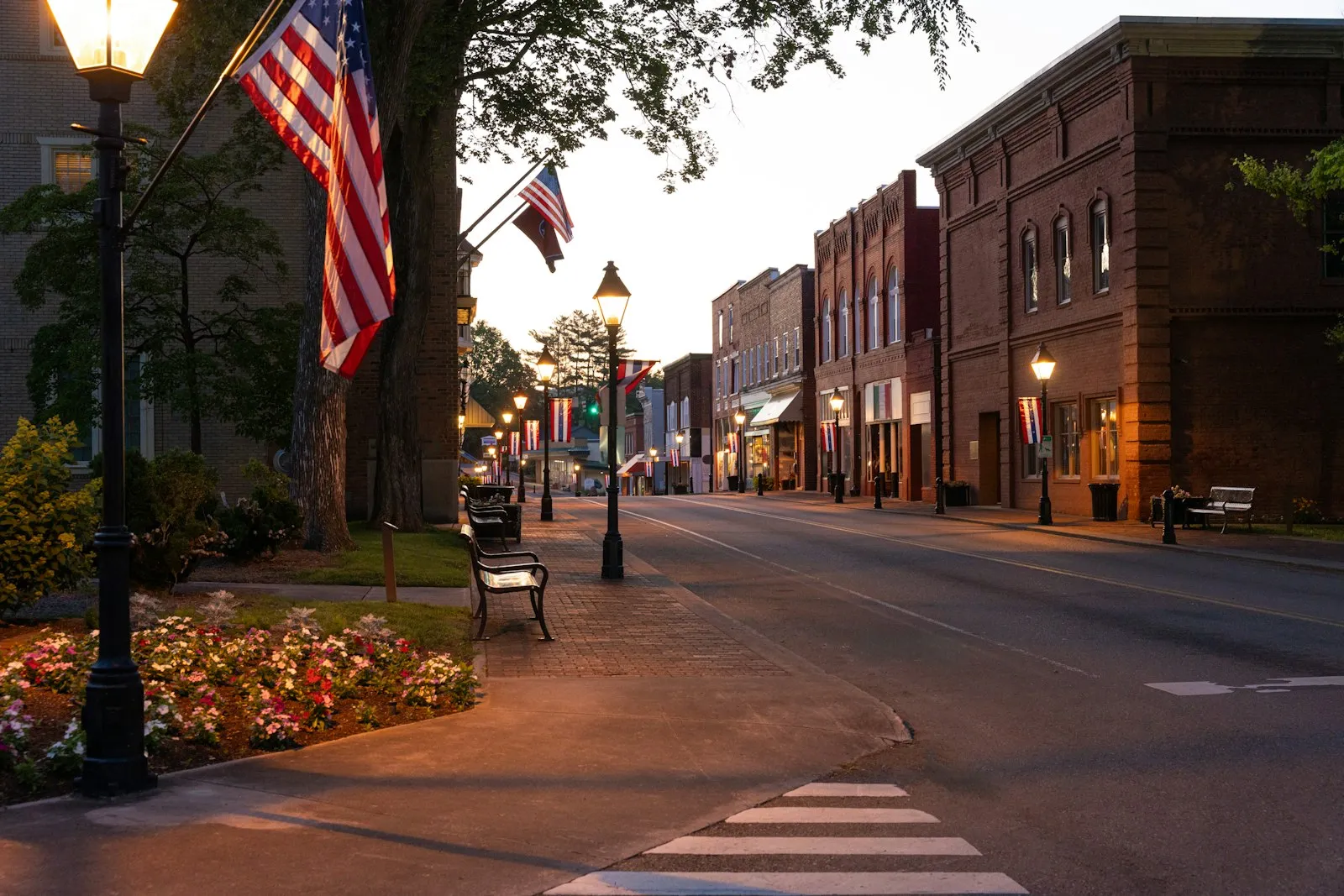 The town hall building at dusk on the main street